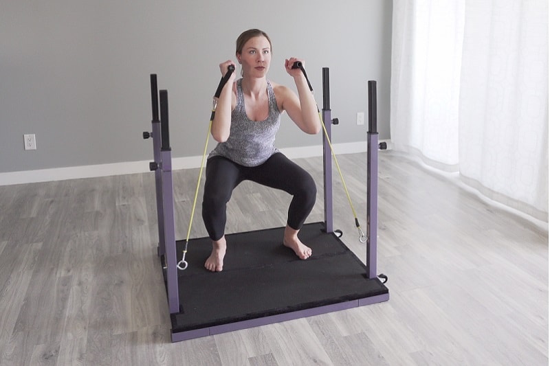 How to do a squat with resistance bands